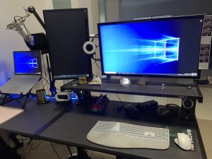 Desk at home with two monitors
